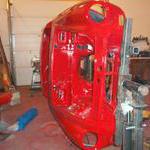 Red resting on rotisserie