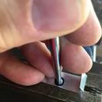 I used an awl to punch the holes