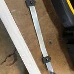 The aluminum flashing strip with speednuts clipped